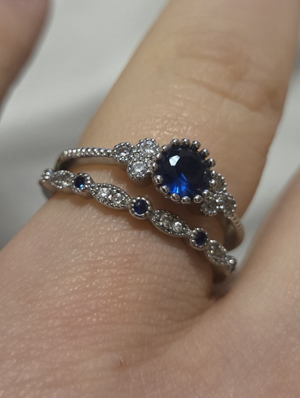 Two-piece blue and clear cubic zirconia ring set — size 8